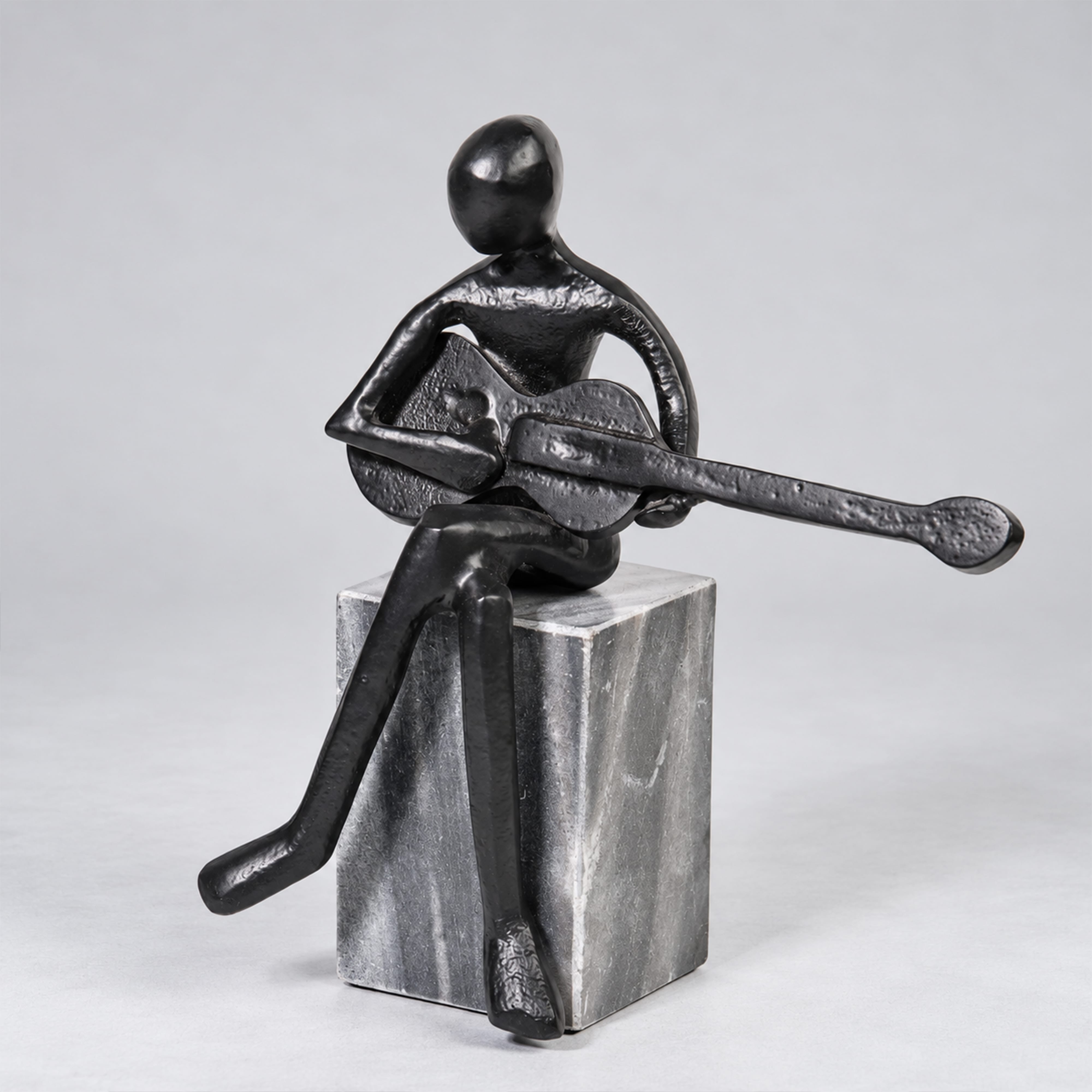 Guitar Player Figurine